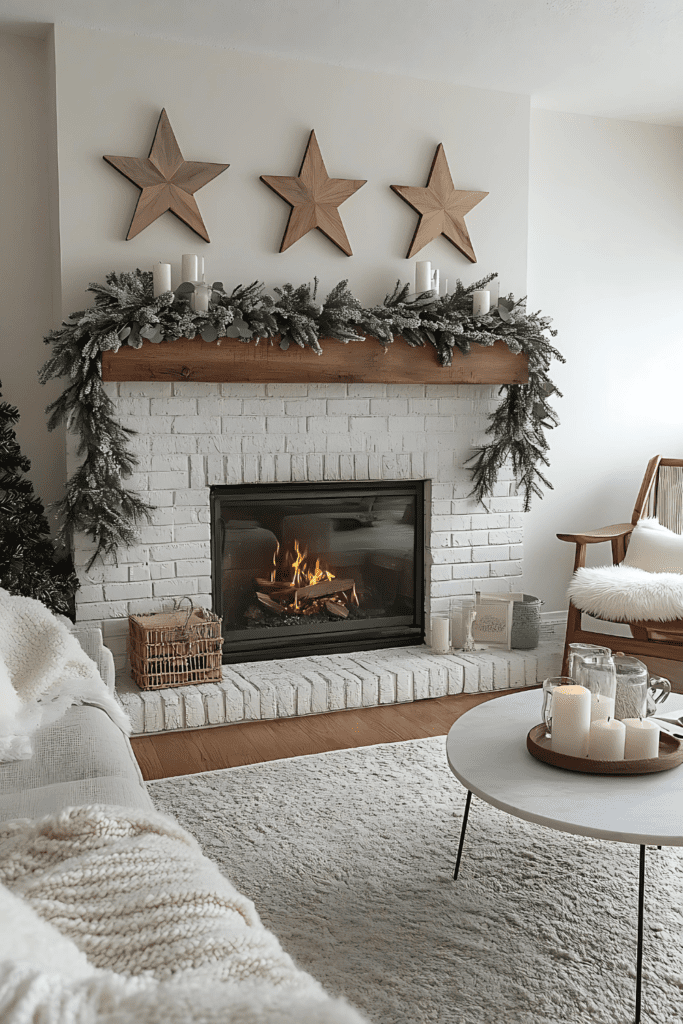 Minimalist Christmas mantel with frosted garland and candles