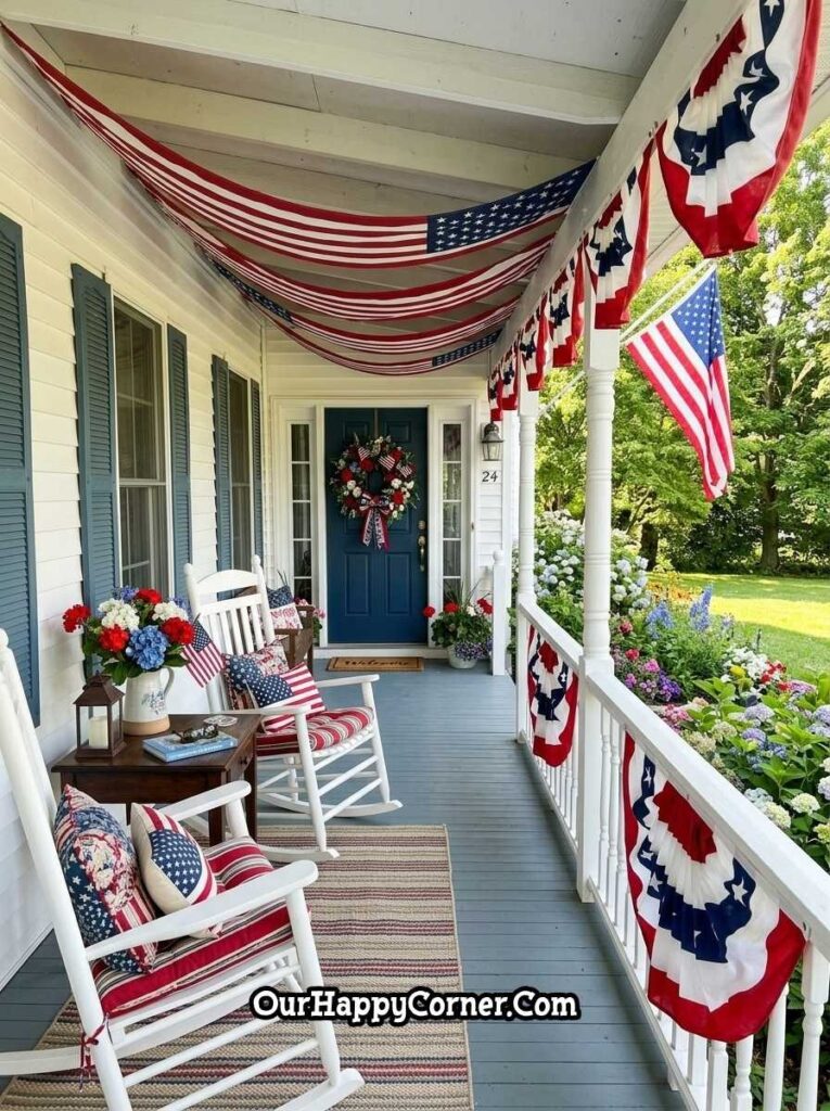 Covered 4th of July porch with draped American flag, bunting, and rocking chairs