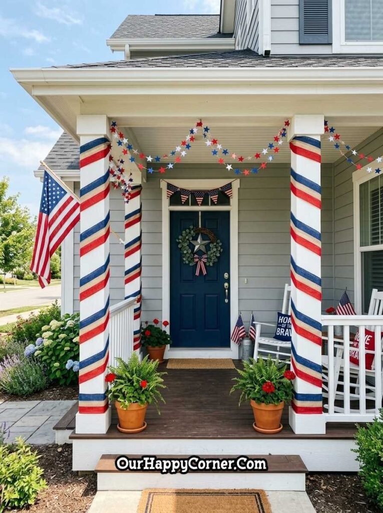 4th of July porch with red white blue wrapped columns and garlands