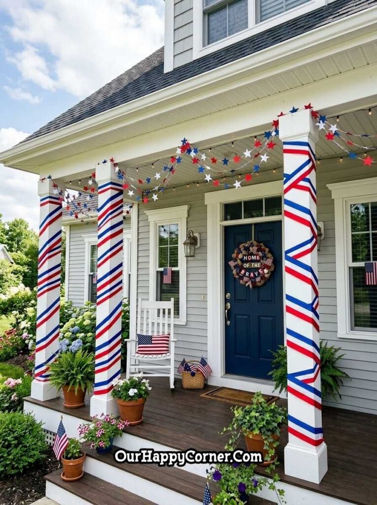 Patriotic porch with ribbon-wrapped columns, star garlands, and front door decor