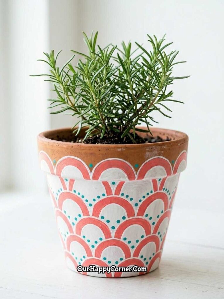 White and coral scallop pattern with rosemary plant