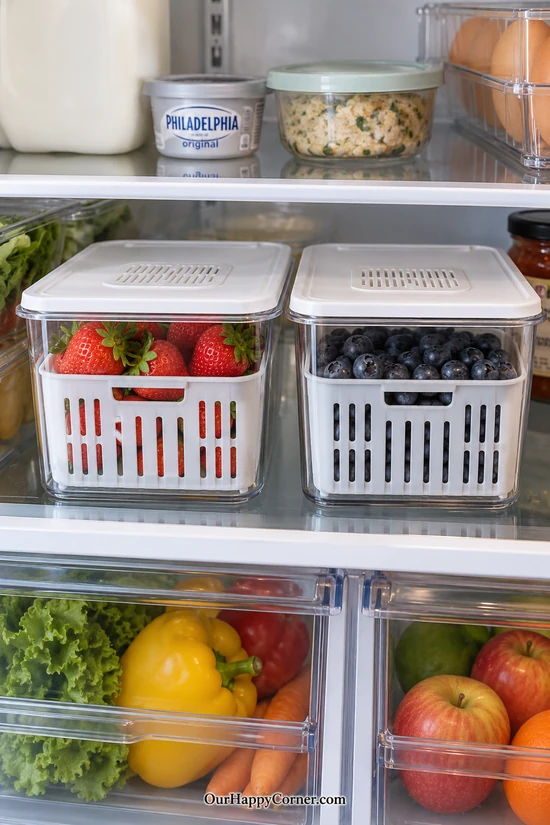 Fridge organization ideas with separate strawberry and blueberry keepers